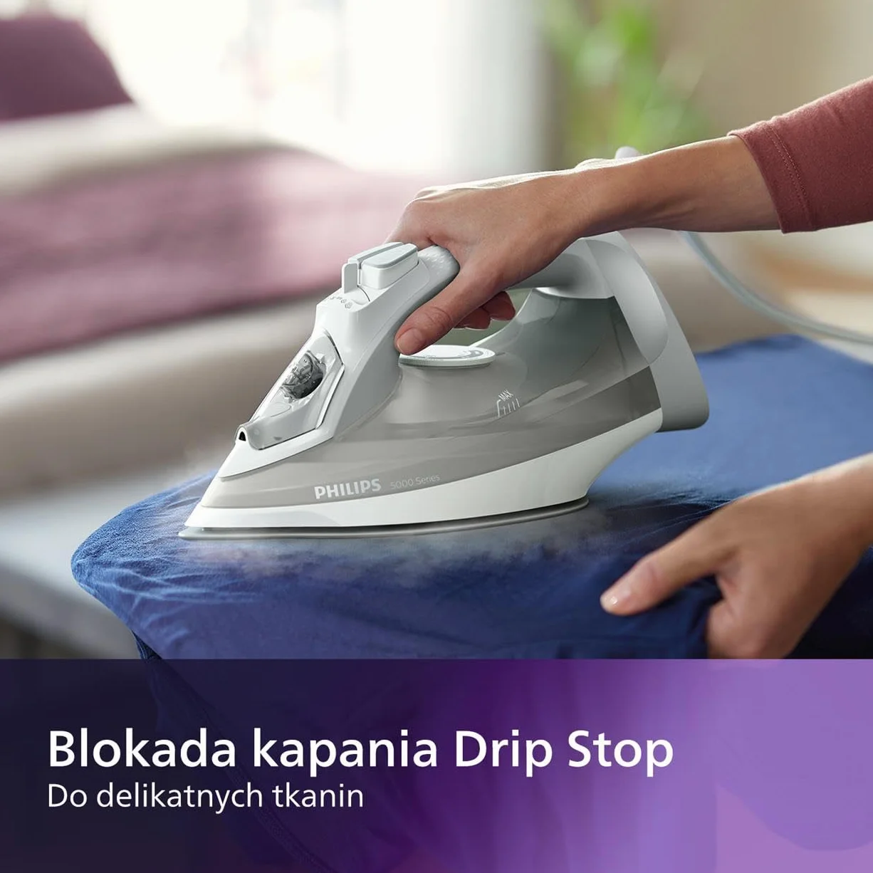 Philips Żelazko Parowe z serii 5000-2400W, Strumień pary 40g/min, Silne uderzenie pary 160g, Pionowy strumień pary, Stopa żelazka SteamGlide Plus, Białe/Szare (DST5010/10)